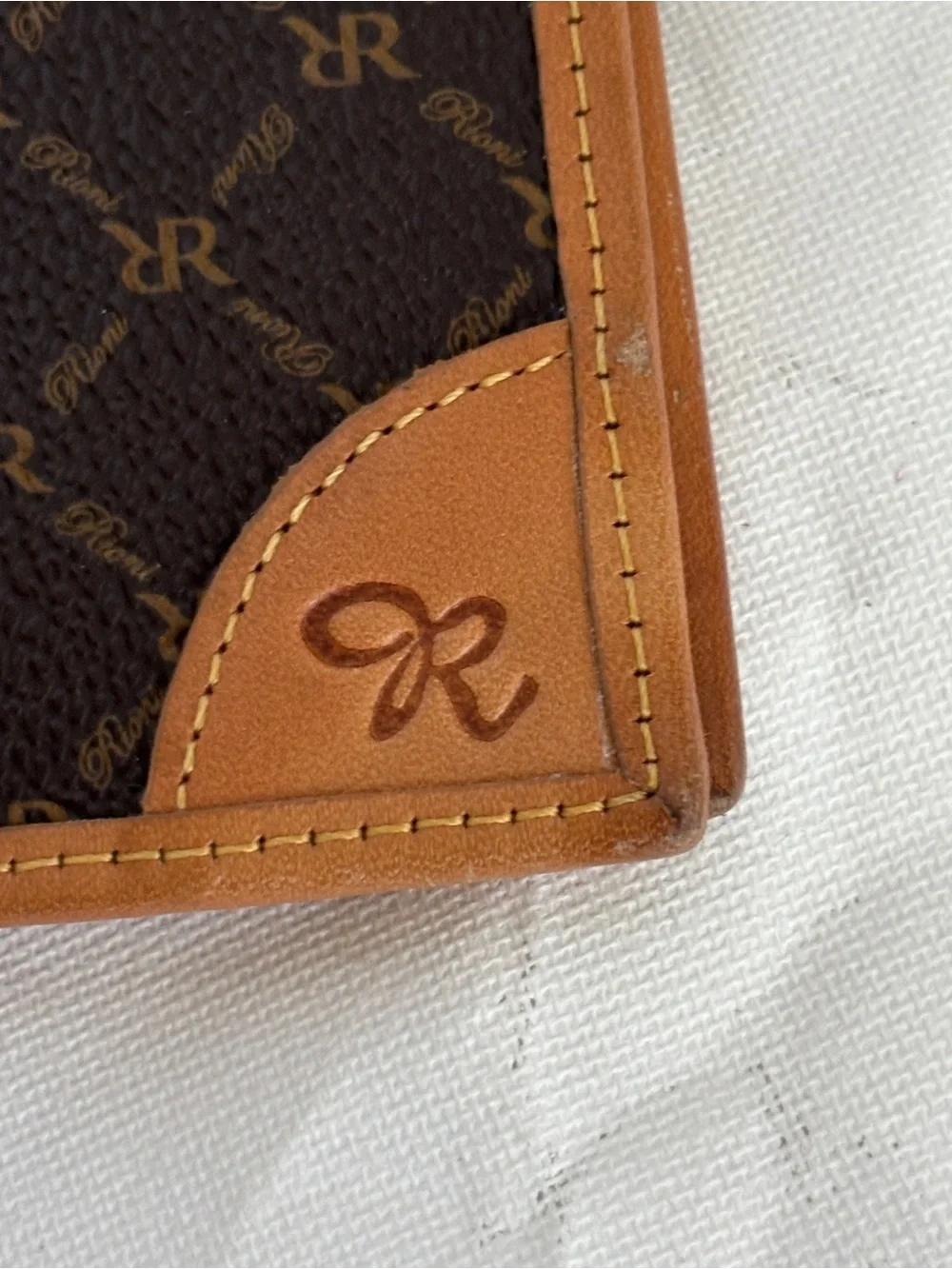 Rioni Brown Patterned Passport Wallet with Tan Trim